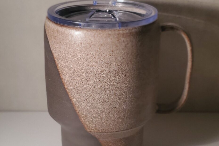handmade-ceramic-travel-mug-with-locking-lid-dark-colored-pottery-with-earthy-glaze